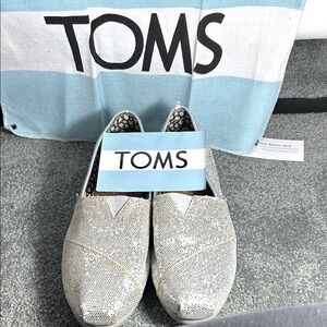 TOMS Glittering Silver Slip-Ons